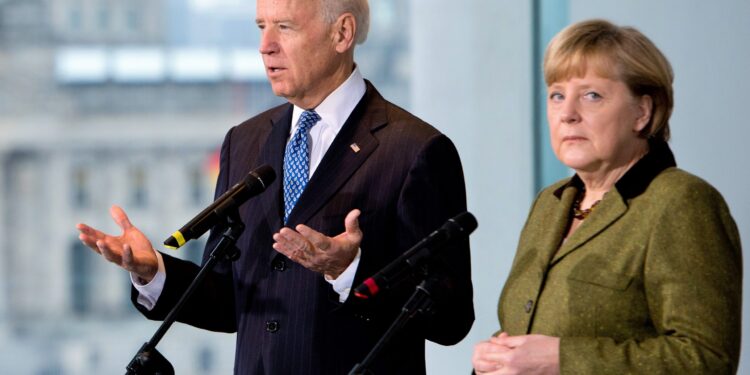 US Vice President Joe Biden and German Chancellor Angela Merkel (R) address journalists at the chancellery in Berlin on February 1, 2013. Biden is in Germany for talks with the German chancellor ahead of the Munich Security Conference. World leaders, ministers and top military brass attend three days of talks at the Munich Security Conference amid a US warning to Iran over stalled nuclear talks. AFP PHOTO / JOHANNES EISELE        (Photo credit should read JOHANNES EISELE/AFP/Getty Images)