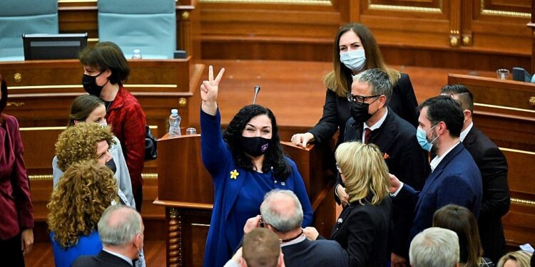 Newly elected President of Kosovo Vjosa Osmani reacts after being sworn-in during a parliament session in Pristina on April 4, 2021. - MPs elected Kosovo's most popular politician Vjosa Osmani as president on April 4, 2021, overcoming an opposition boycott that had kept parliament short of a quorum one day earlier. Osmani, 38-years-old, is a law professor who belongs to a new political generation in the Balkan territory vowing to eradicate widespread corruption. (Photo by Armend NIMANI / AFP)