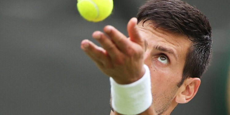 (220628) -- LONDON, June 28, 2022 (Xinhua) -- Novak Djokovic serves during the mens singles first round match between Novak Djokovic of Serbia and Kwon Soonwoo of South Korea at Wimbledon Tennis Championship in London, Britain, on June 27, 2022. (Xinhua/Li Ying)